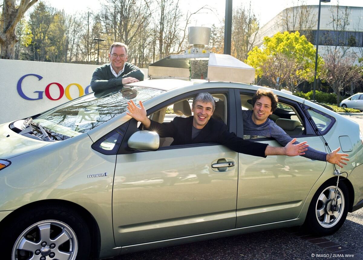 Die beiden Google Gründer Larry Page, Sergey Brin mit Eric Schmidt